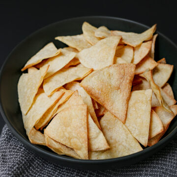 close up of chips in black bowl.