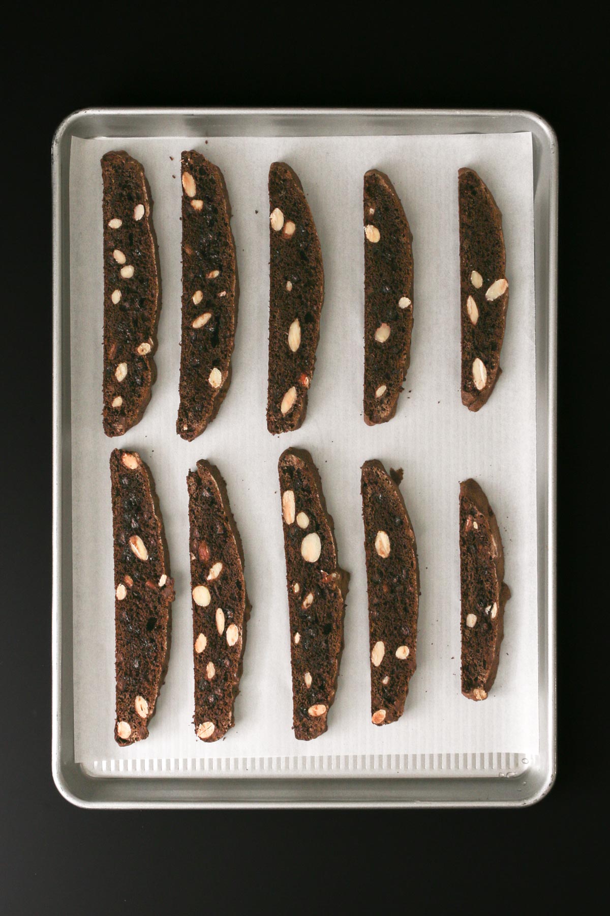 slices of biscotti on parchment paper.